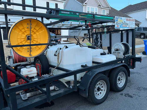 Pressure washing equipment inside trailer