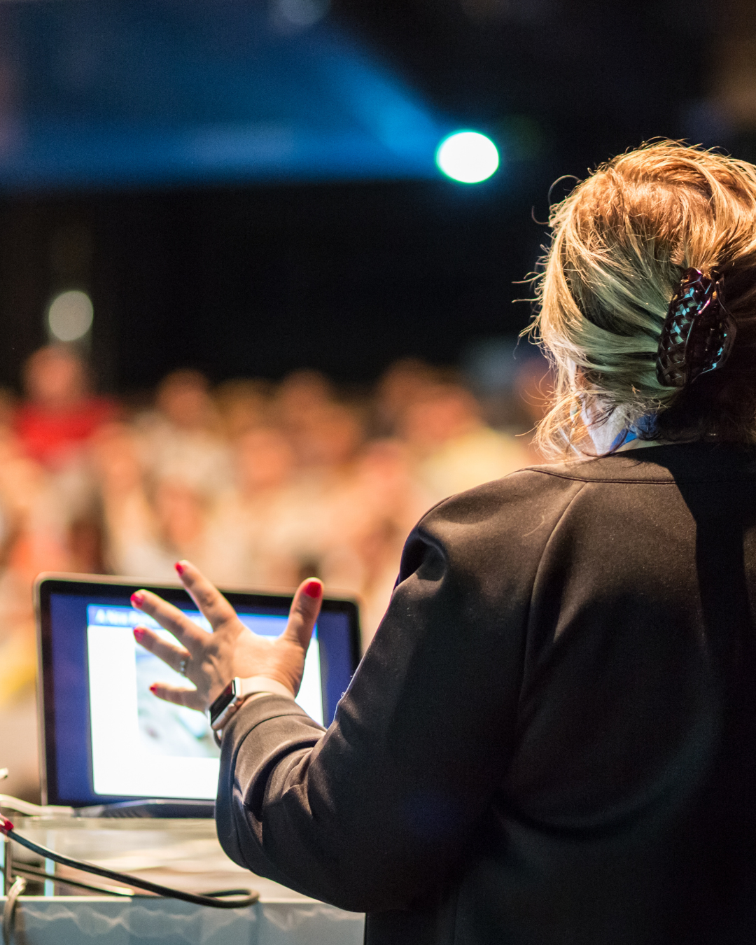 Professional speaker presenting to an audience