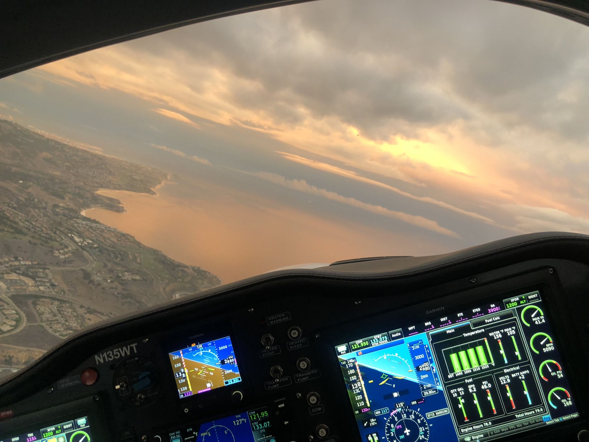 View from a Sling cockpit over the coast