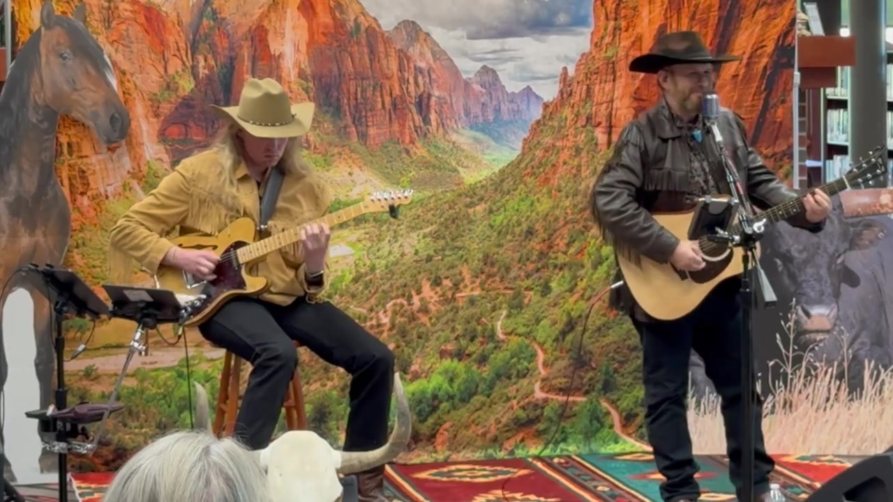 Cowboy Singers & Guitar Pickers performing at the library