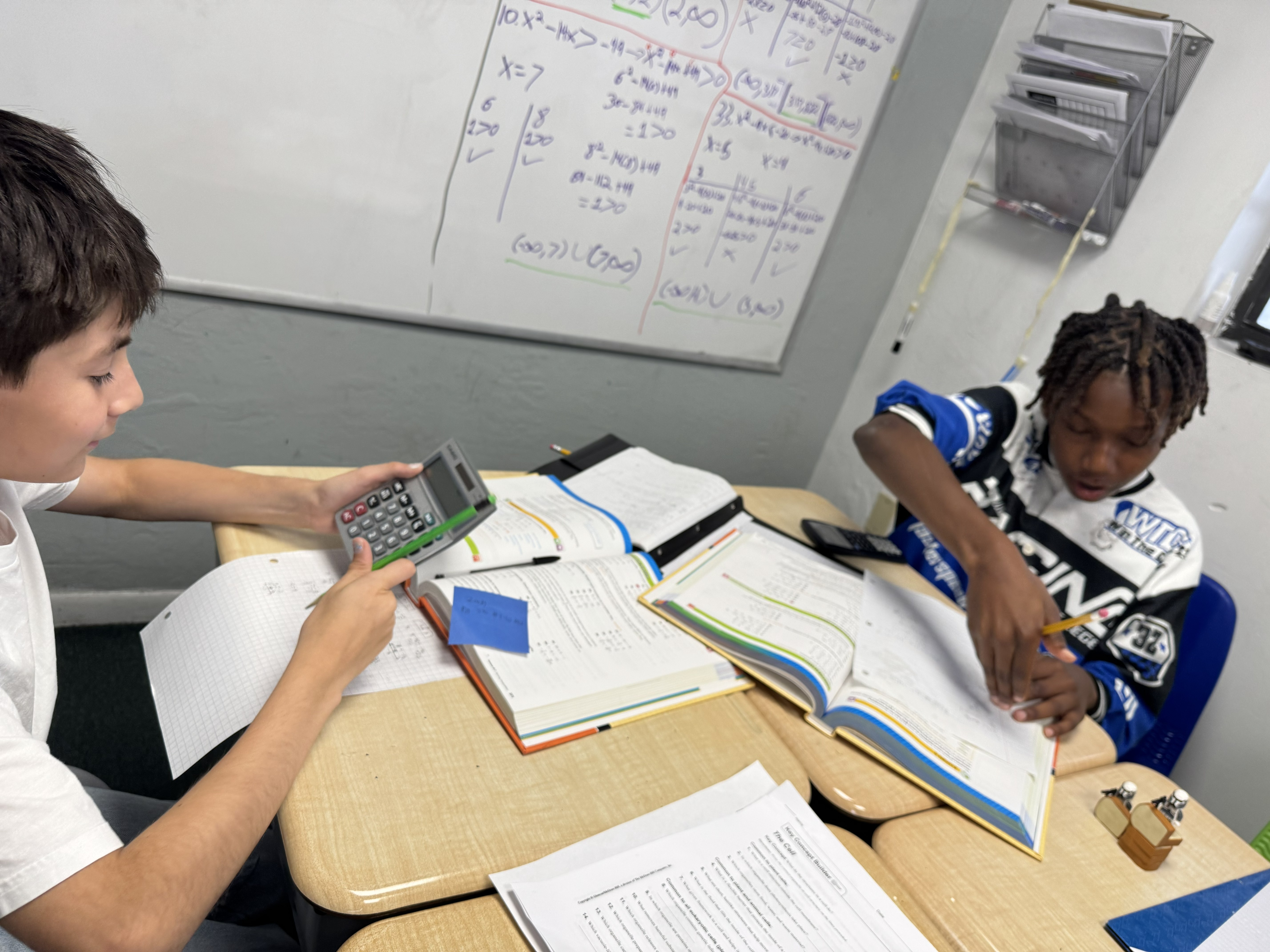 Students working on academic assignments at MLC Tutoring