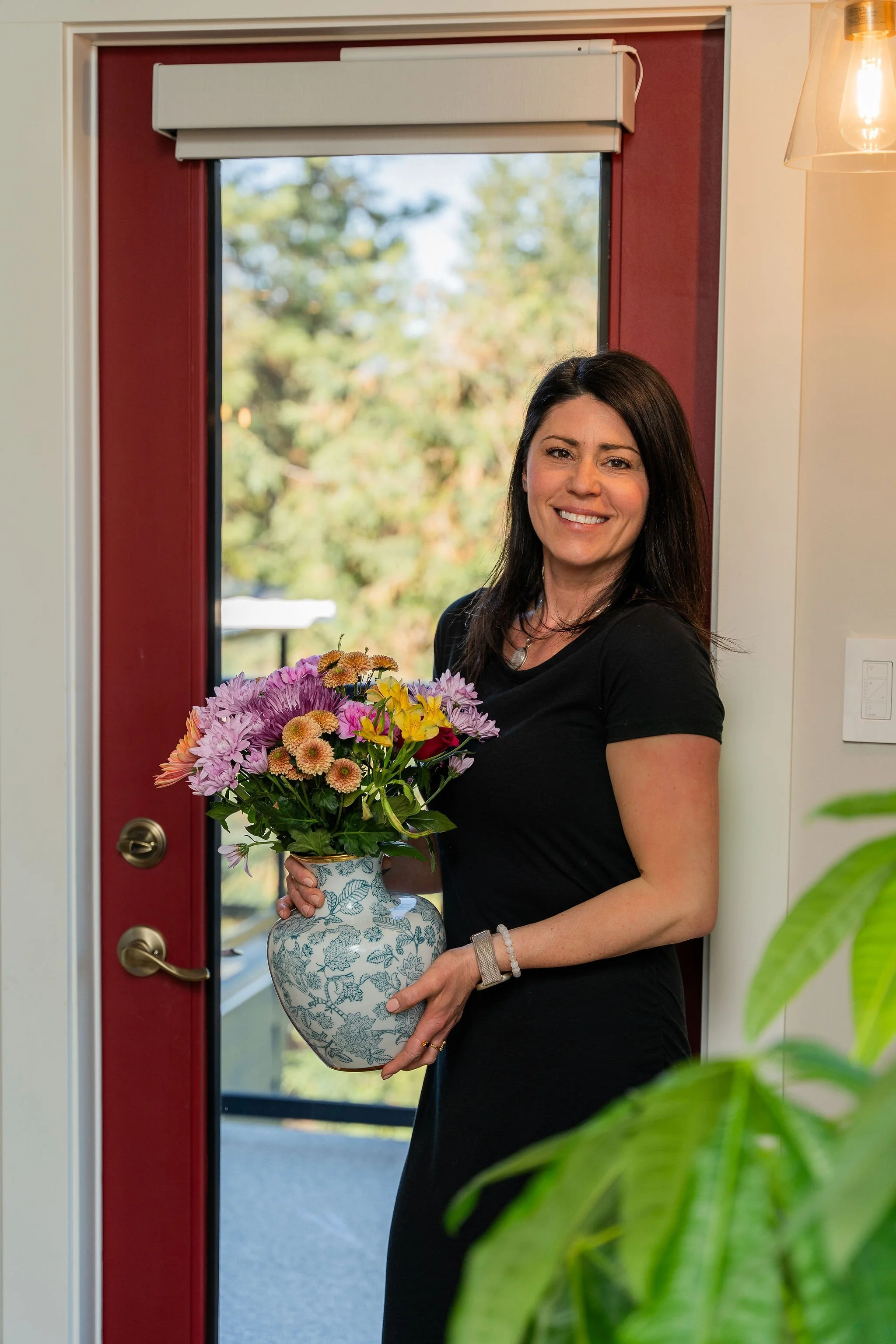 Andrea holding flowers
