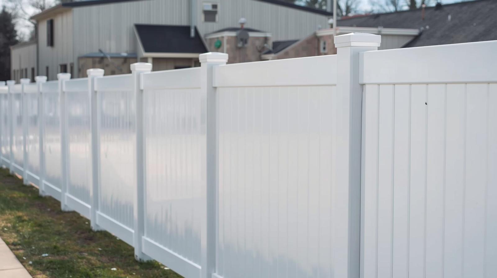 Vinyl fence installed around commercial property in Rockford IL.