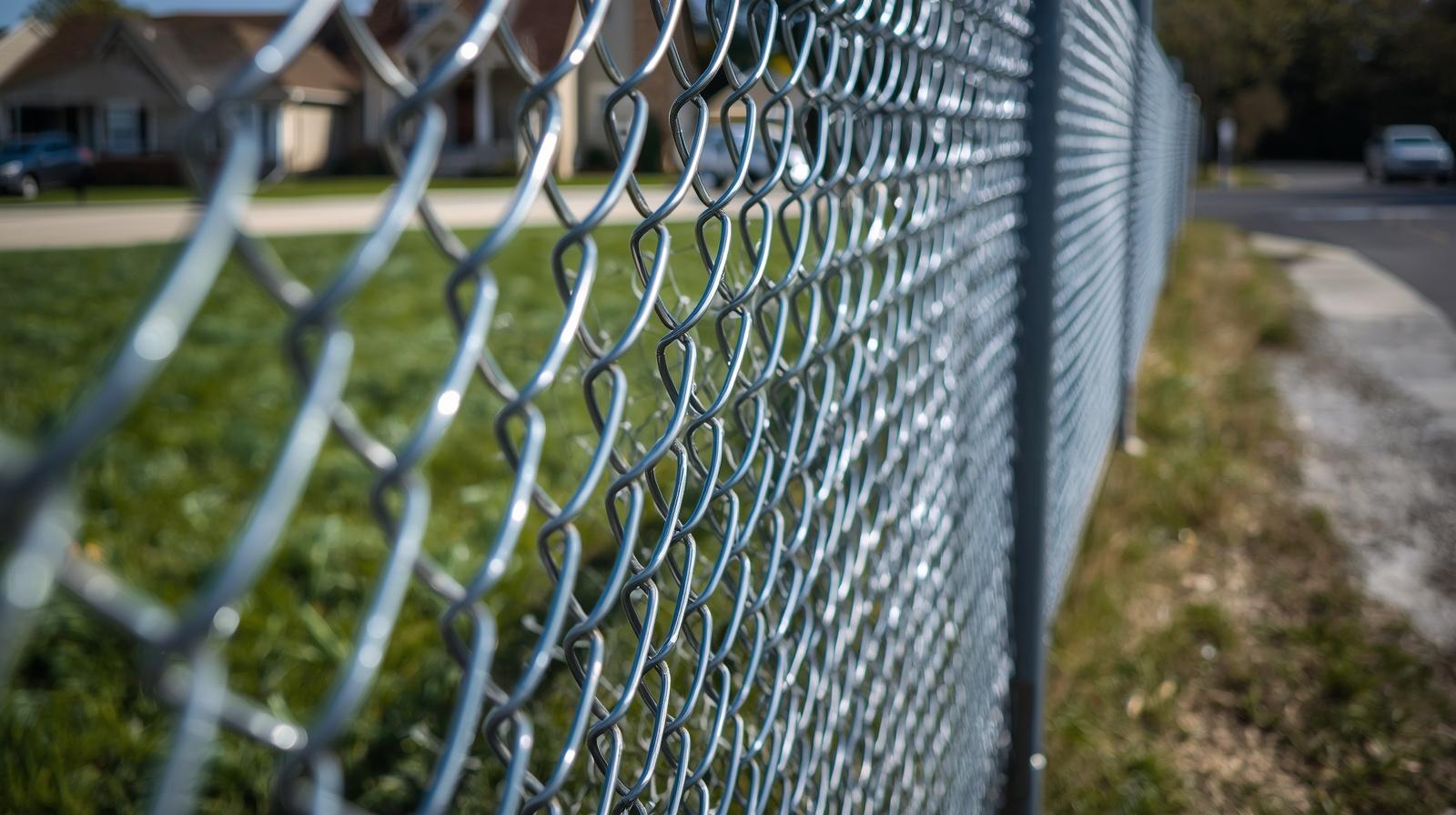Chain link fence installation serving residential and commercial properties in Machesney Park IL.