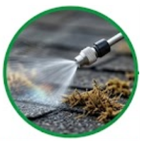Roof treatment sprayed on roof surface