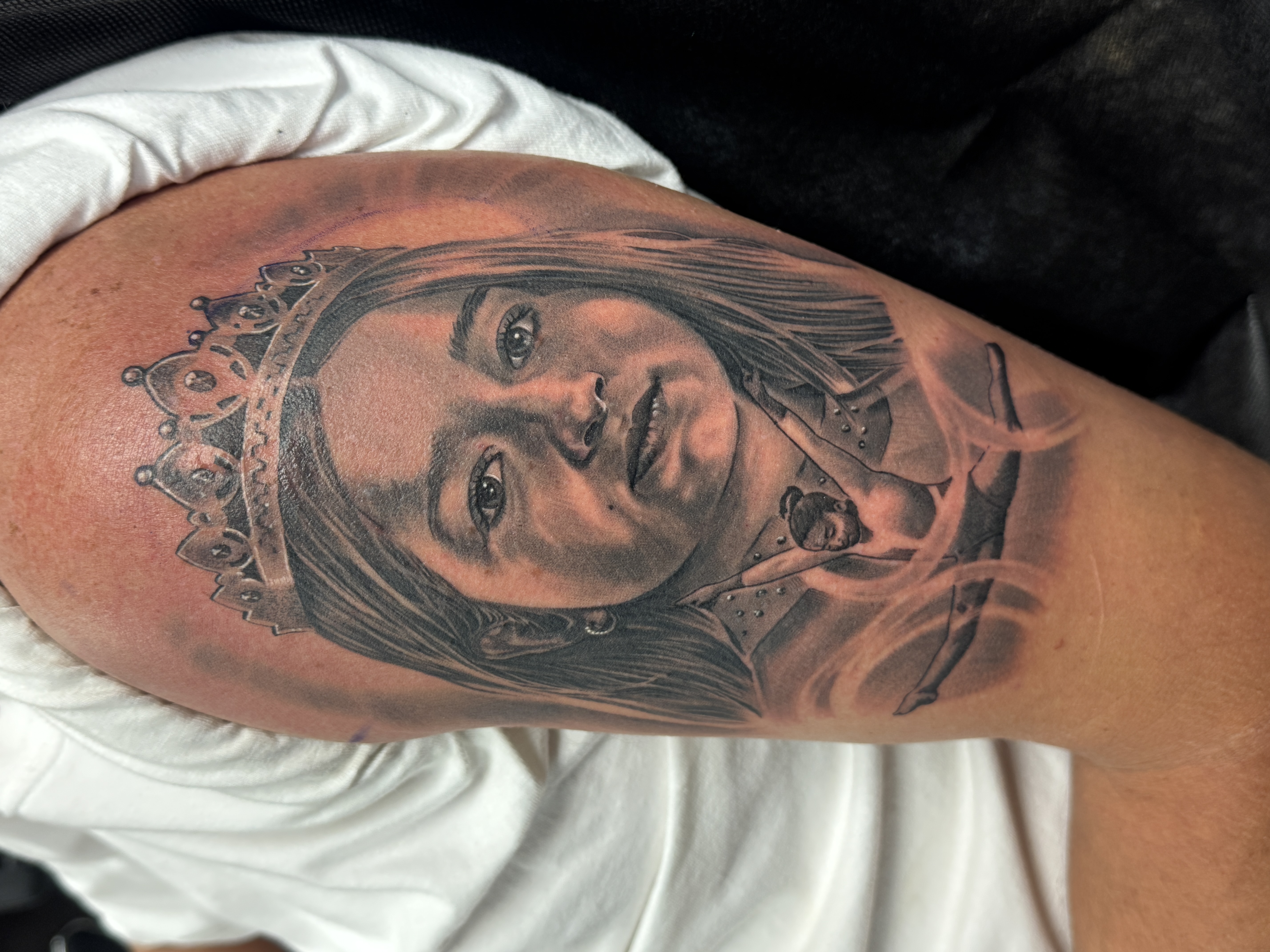 Black and grey portrait tattoo