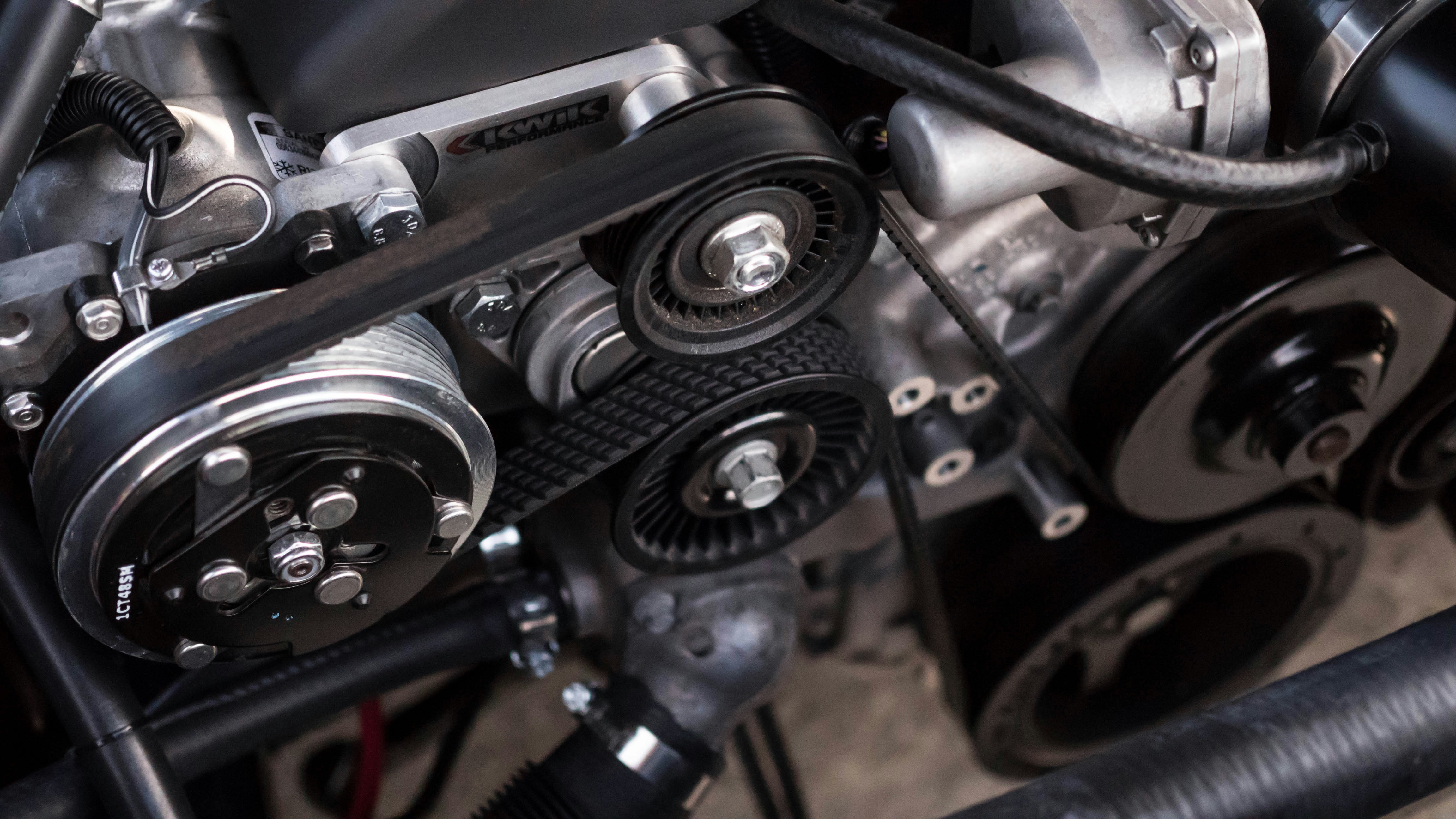Diesel mechanic performing air brake system repair on a heavy-duty truck