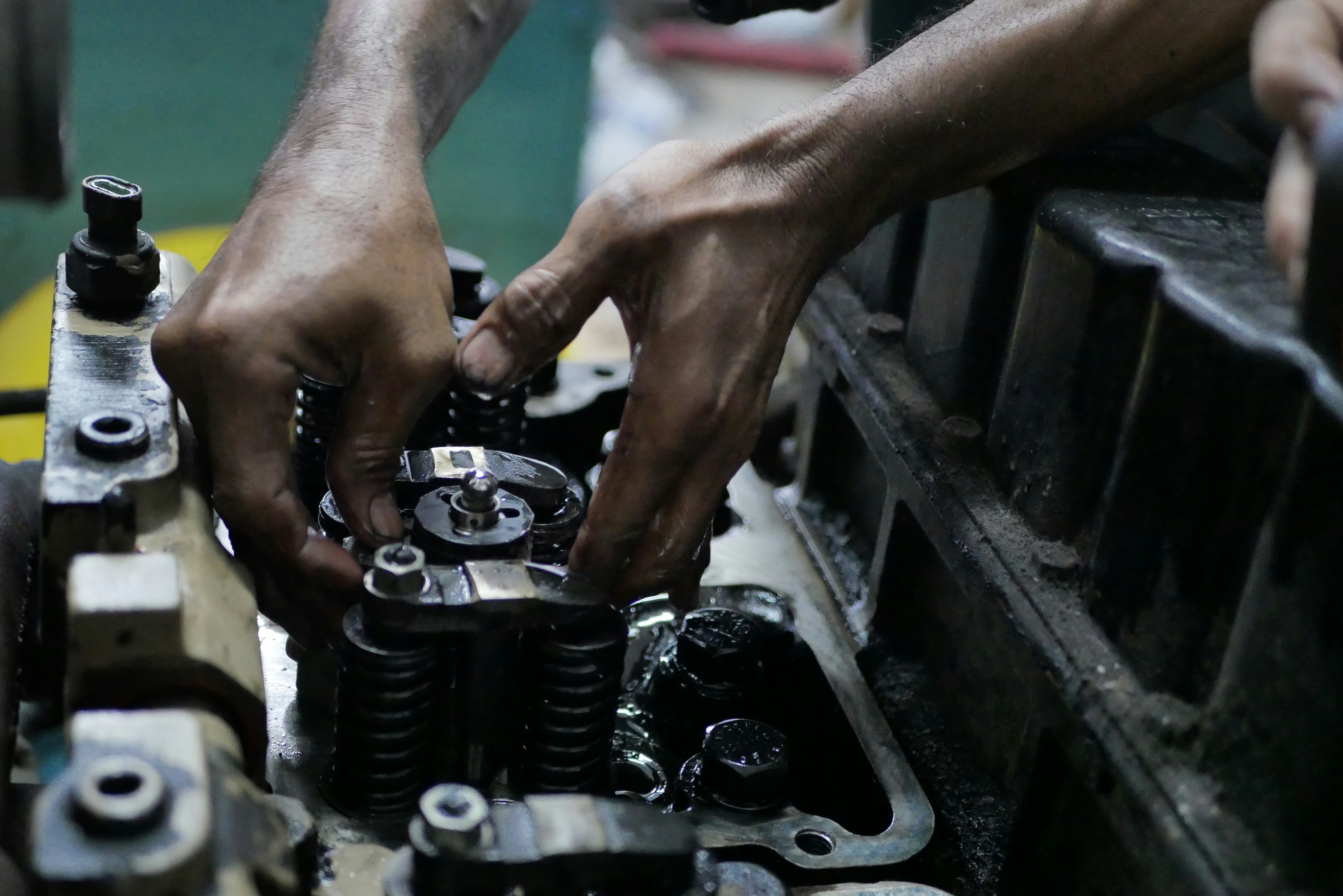 Mechanic using diagnostic tool on a heavy-duty truck air brake system