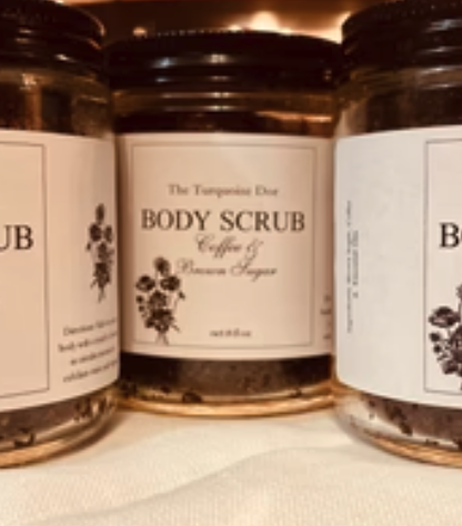 Open jar of brown sugar and coffee scrub