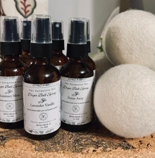 All-natural lavender laundry soap on folded linens
