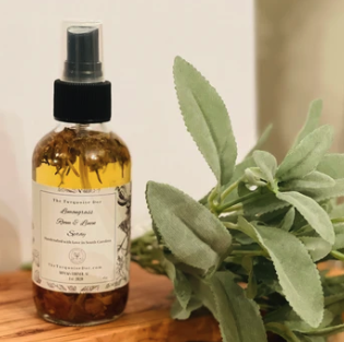 Amber bottle of natural beard serum on dark leather