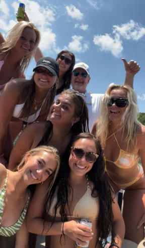 Friends celebrating a birthday on Lake Norman