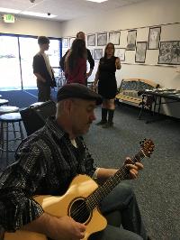 Tim Hillwood playing at a community art event