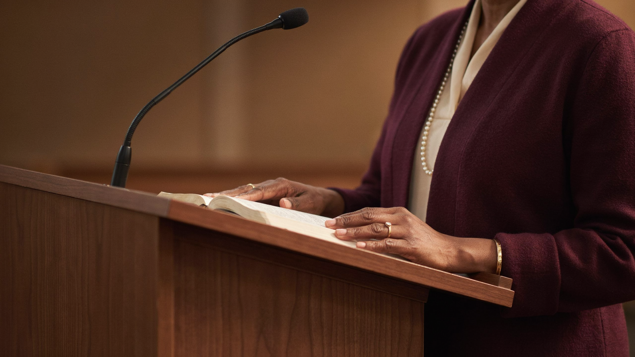 Kathleen M. Lowe teaching at a lectern