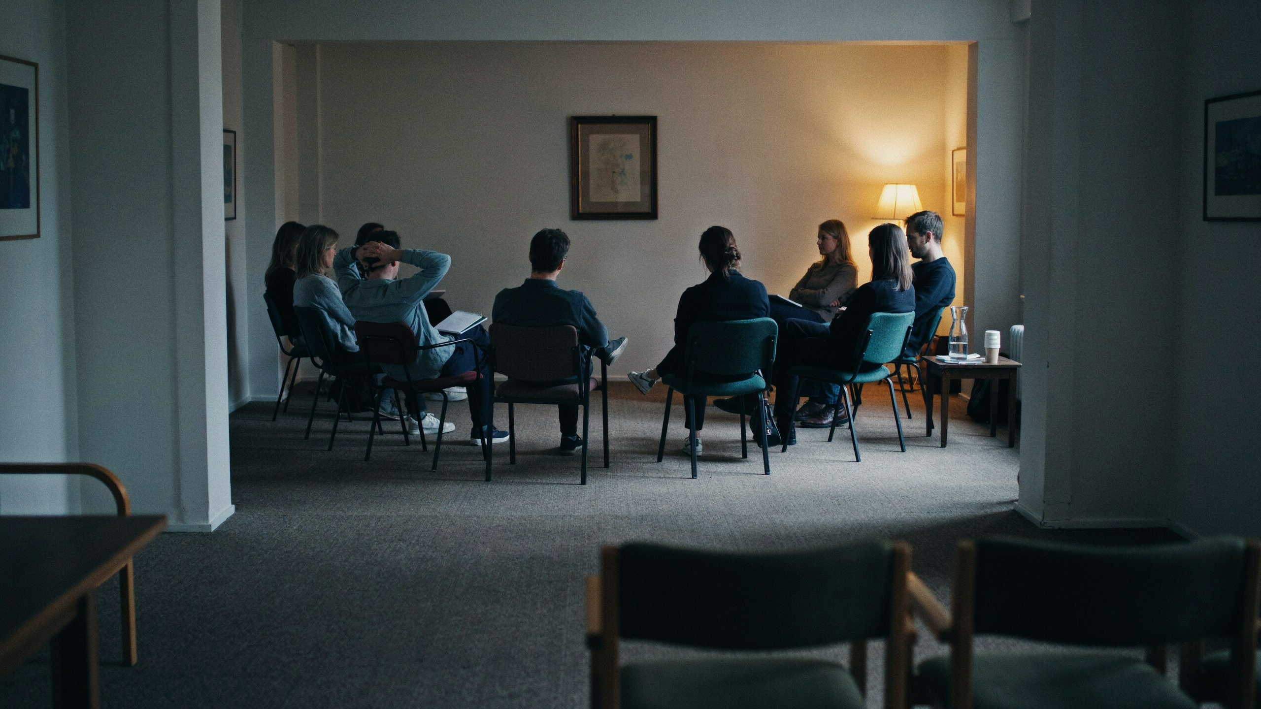 An evening chapter seminar seen from the back of the room