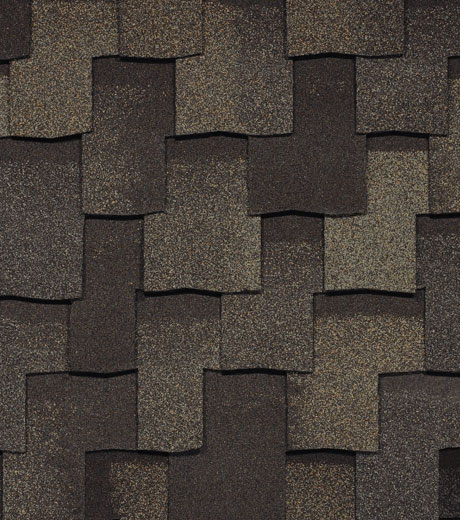 Asphalt shingle roofing material in dark tones, showcasing a textured and layered pattern ideal for durable and affordable roof installations.