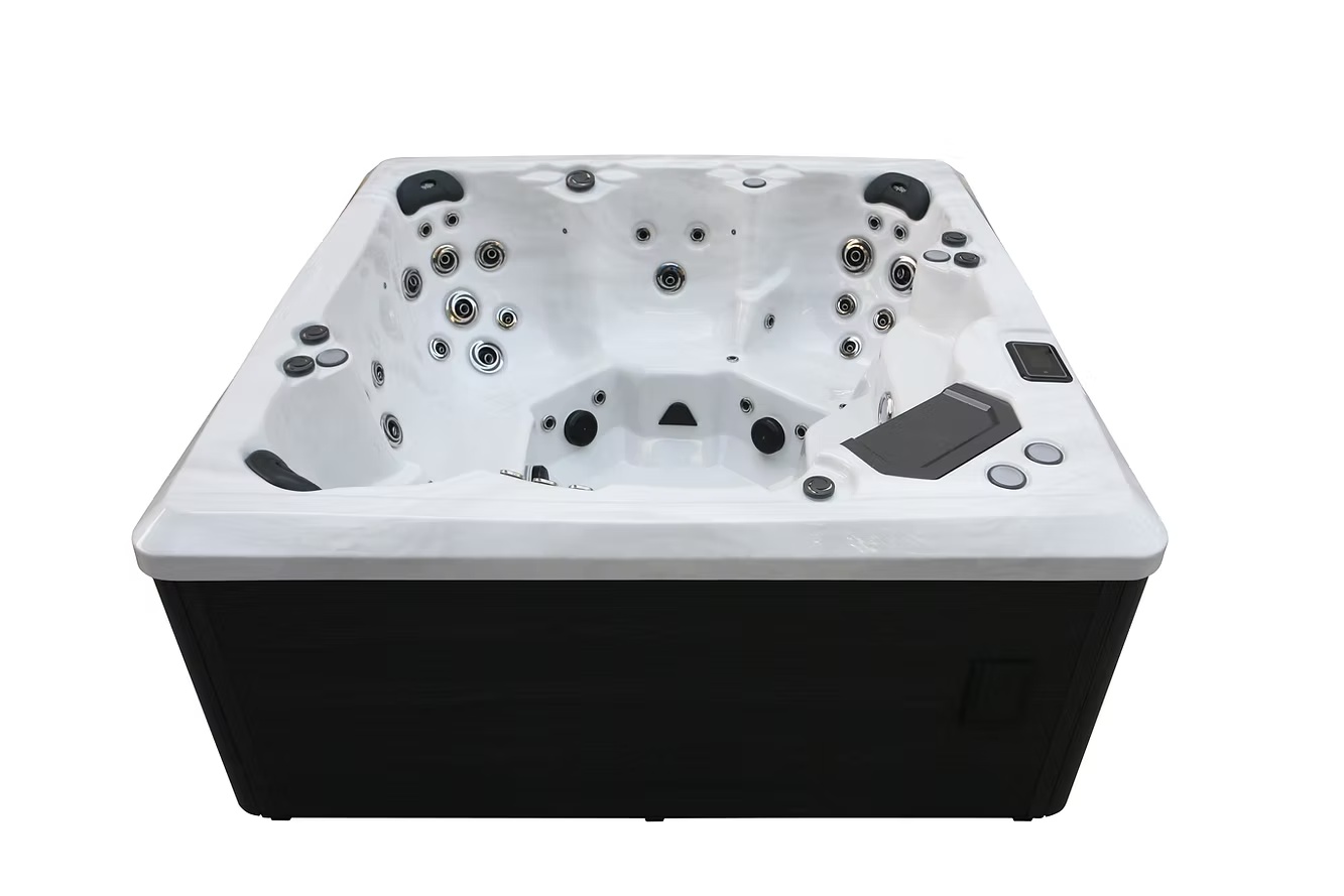 New hot tub with a white shell, dark cabinet and contoured hydrotherapy seating