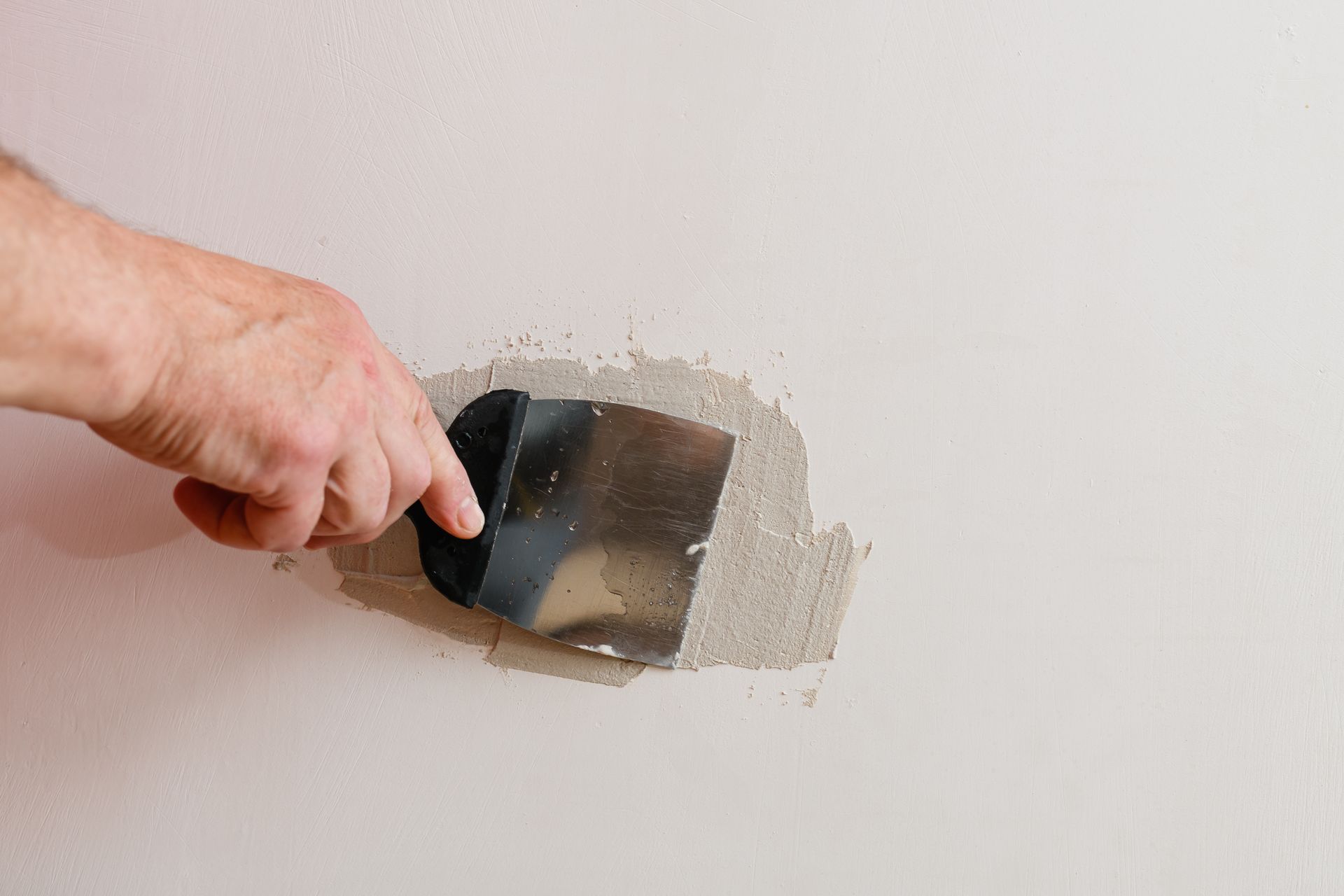 Drywall crack repair and texture matching in a Reno home