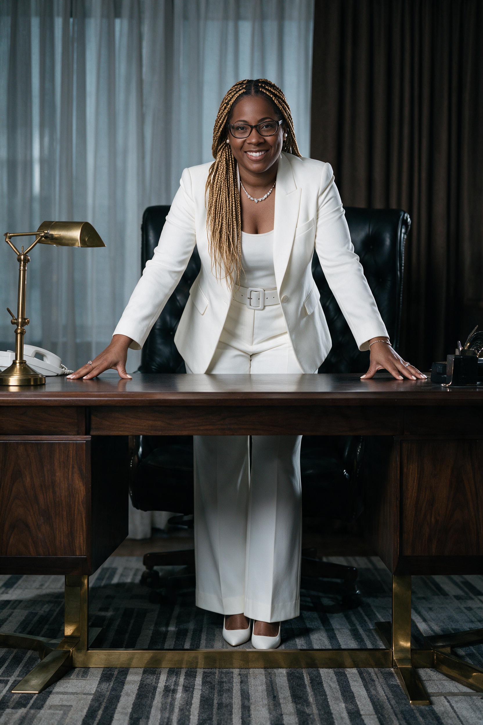 Dekisha Posey, REALTOR, standing at her desk