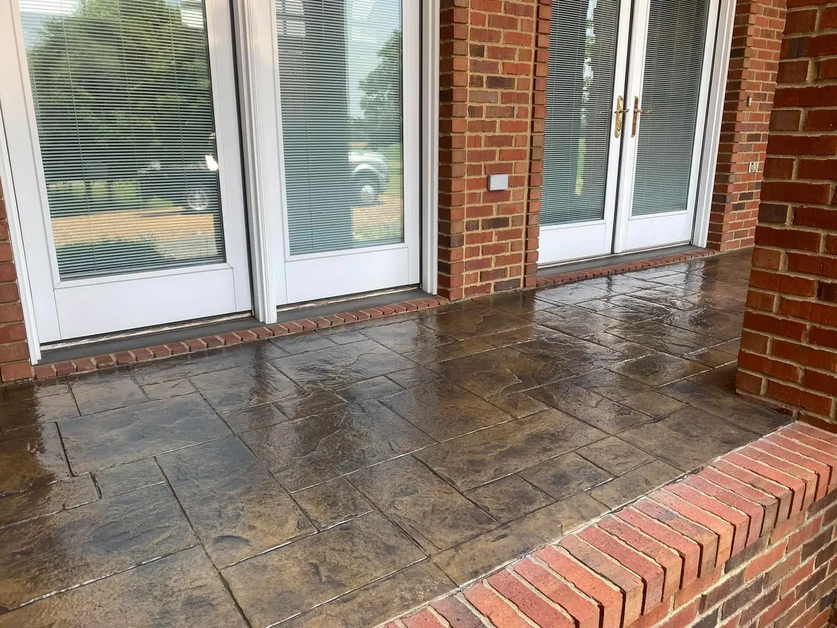 Stamped decorative concrete porch and walkway by Blackburn Construction