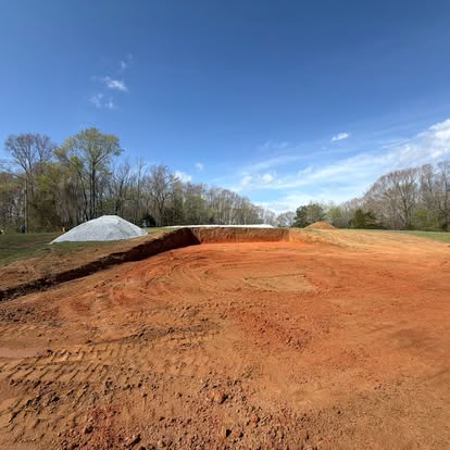 Graded building pad cut into a Middle Tennessee property by Blackburn Construction