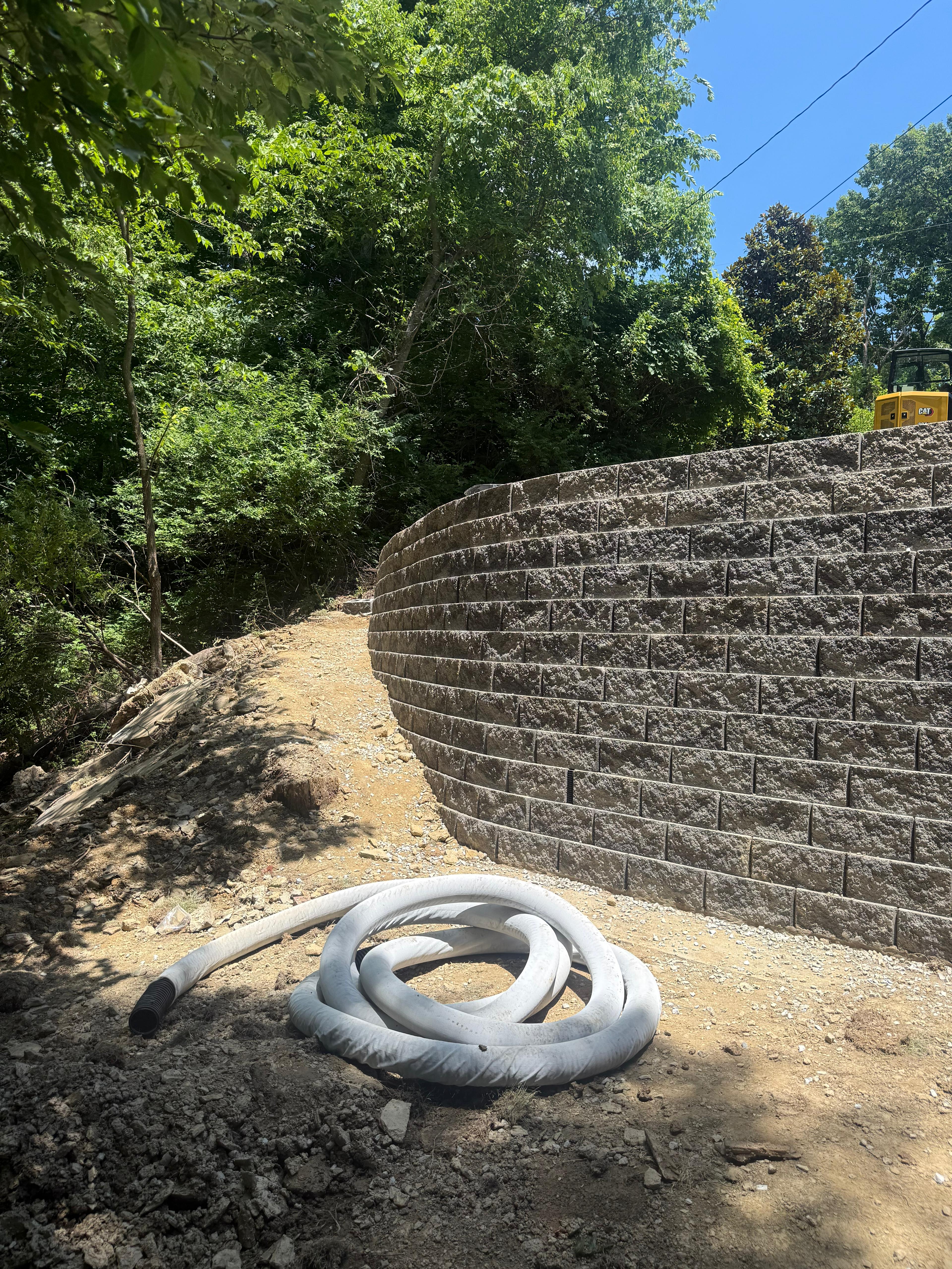 Stone retaining wall installation in La Grange