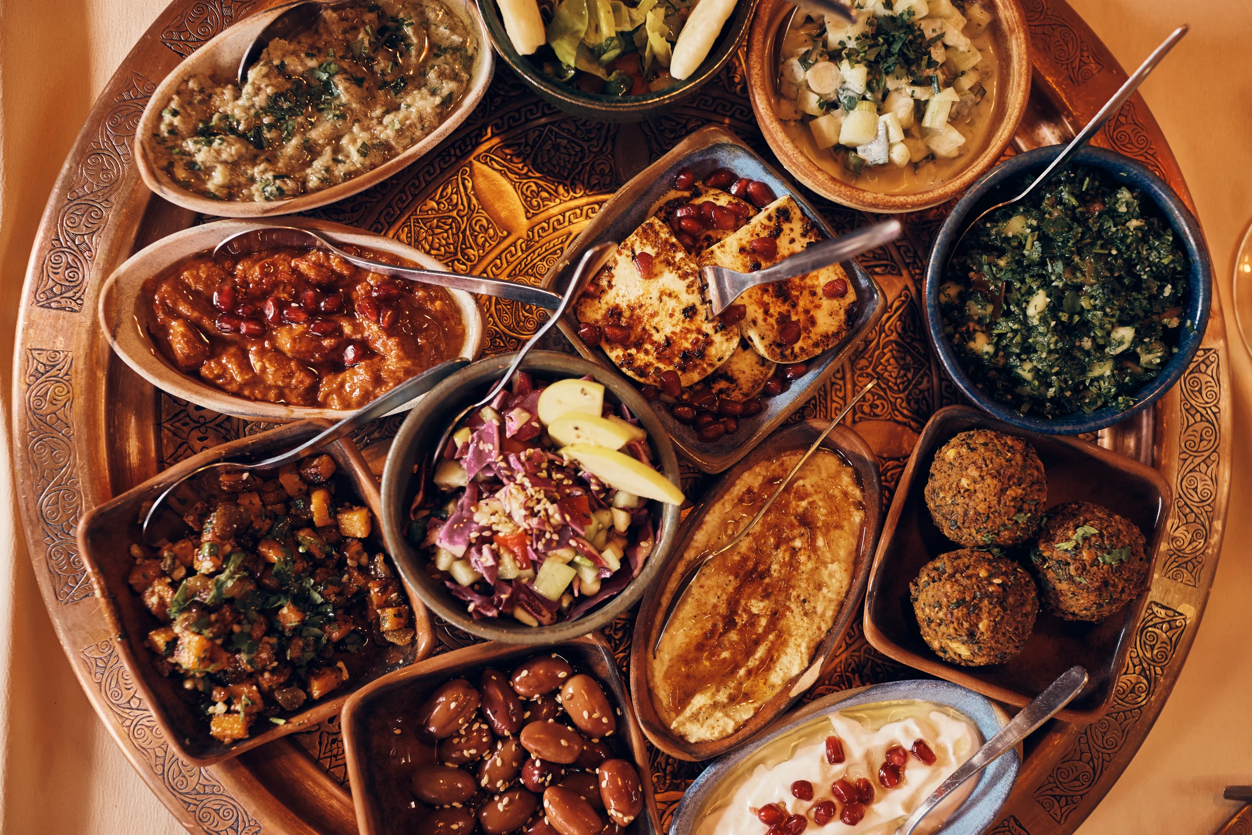 Mediterranean food spread at Pita House Big Bear Lake — shawarma platter, hummus, and fresh pita bread