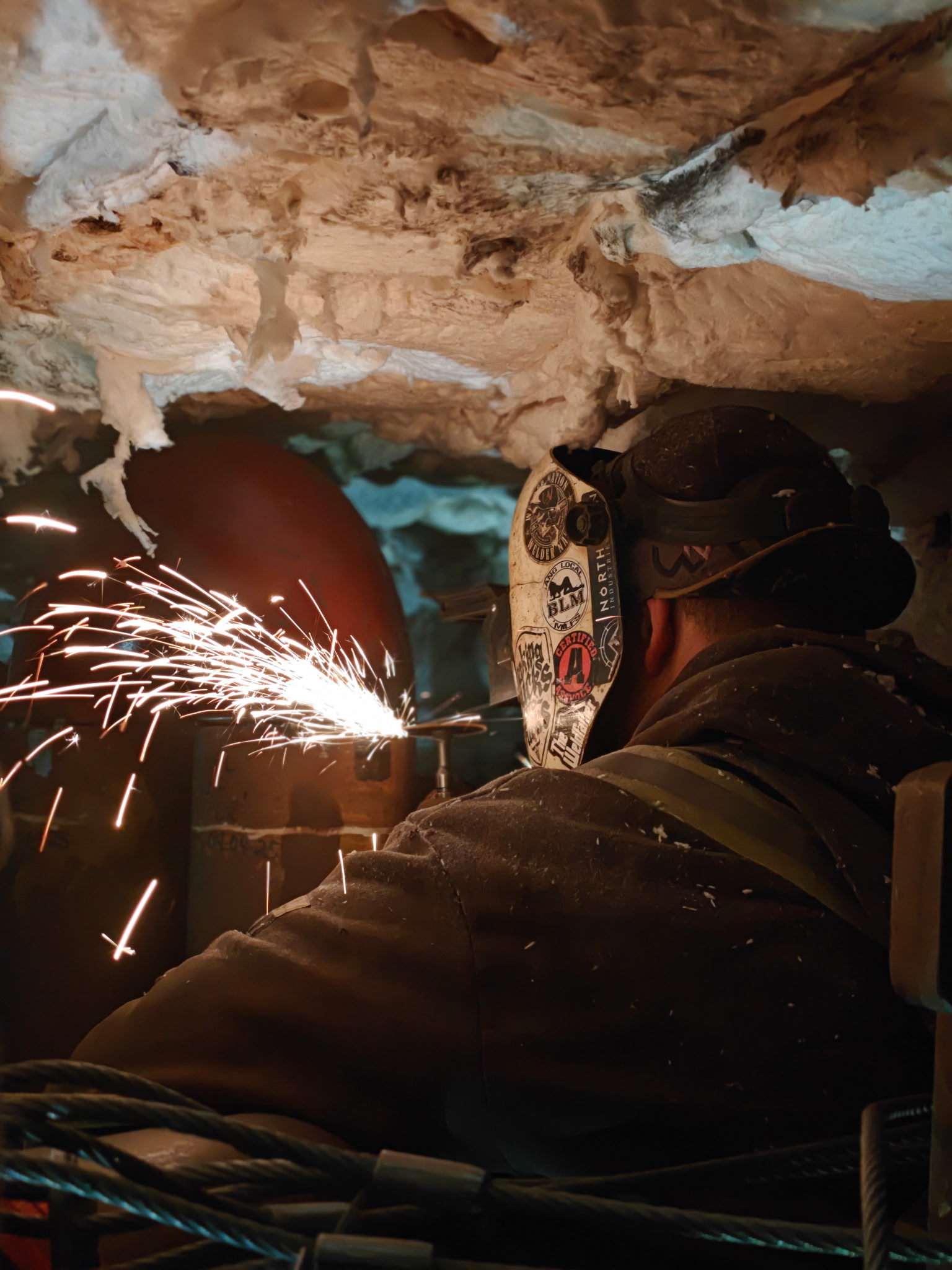 North Twin Industries welder mid-repair