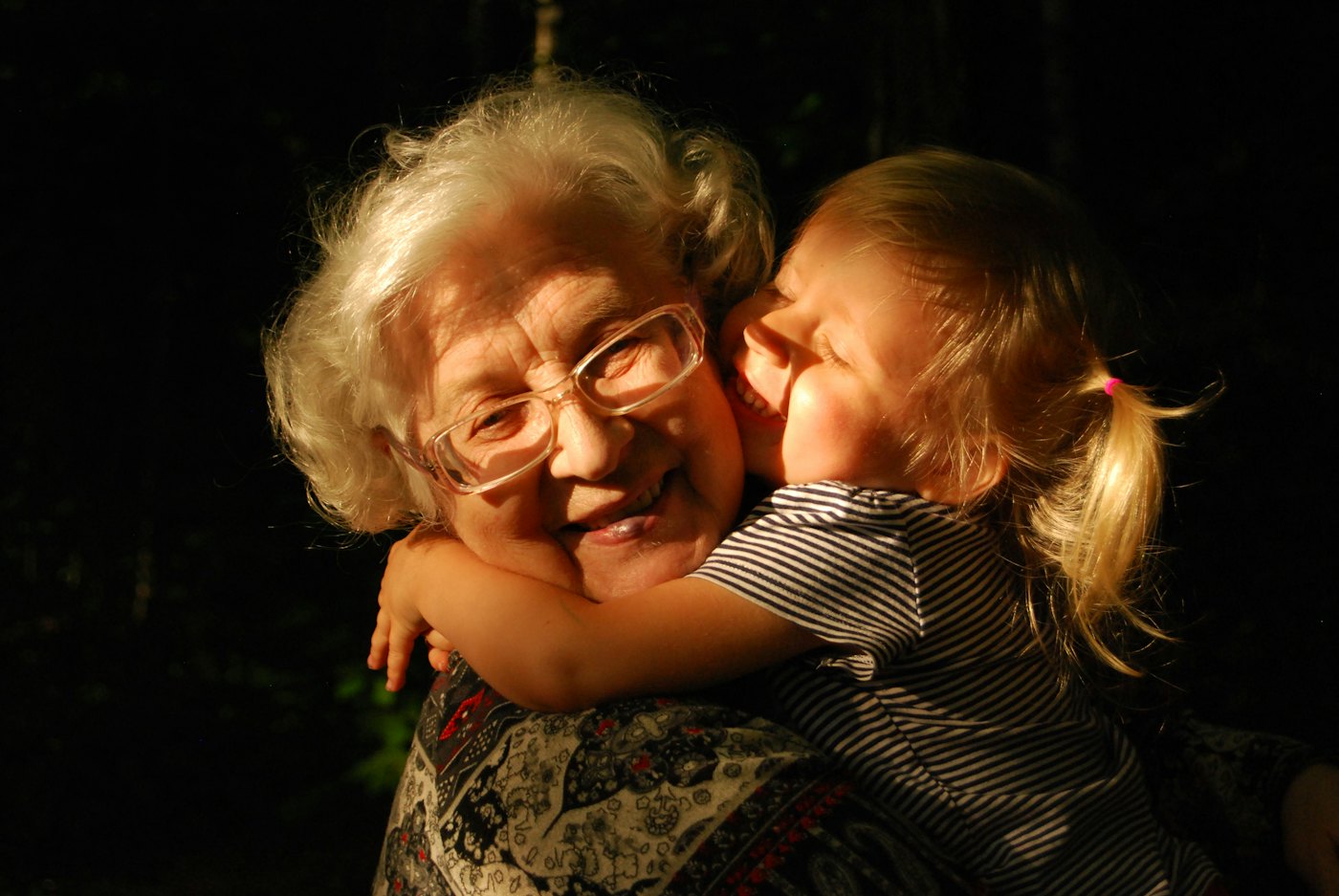 Grandmother hugging her grandchild