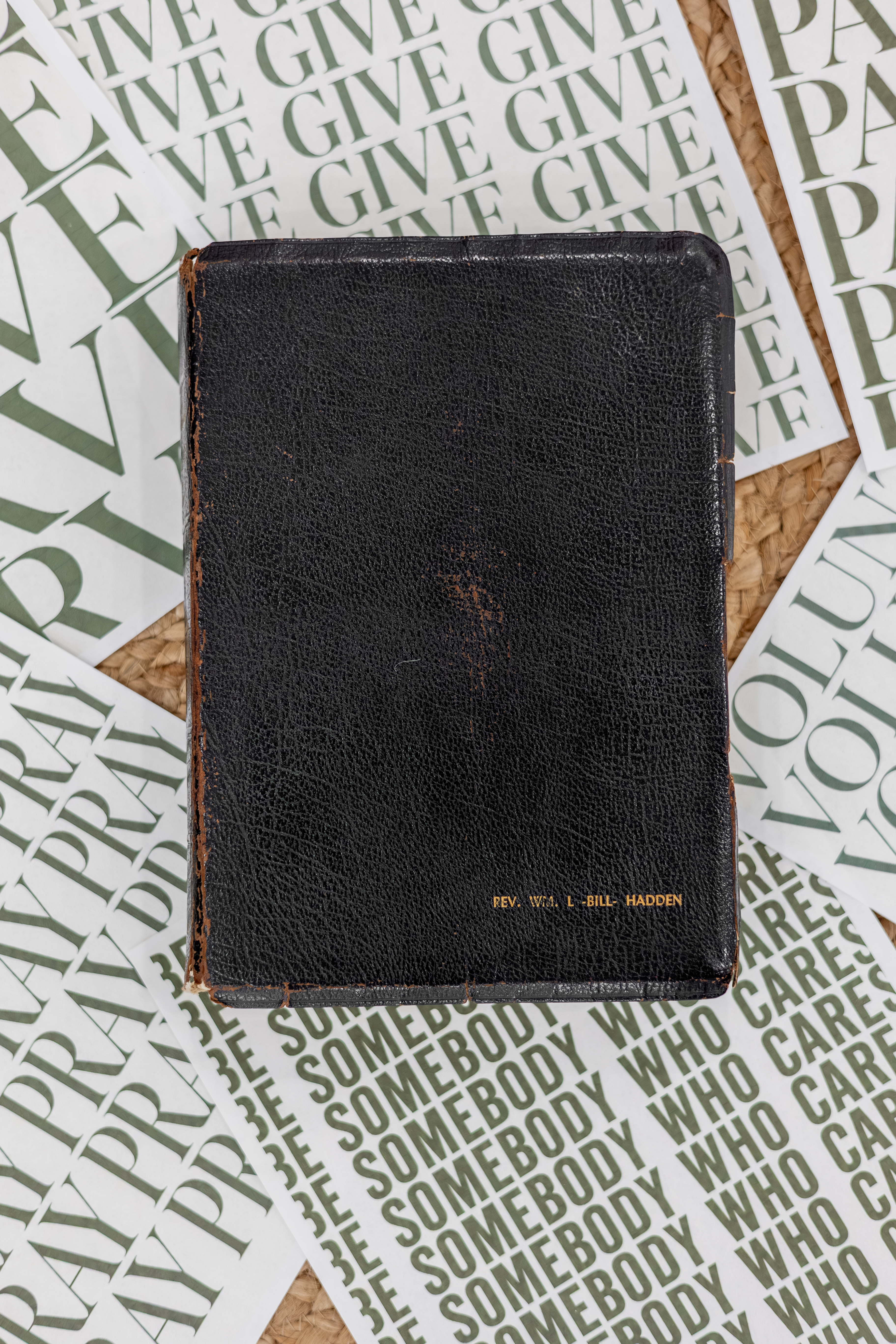 A meaningful keepsake resting on Somebody Cares materials