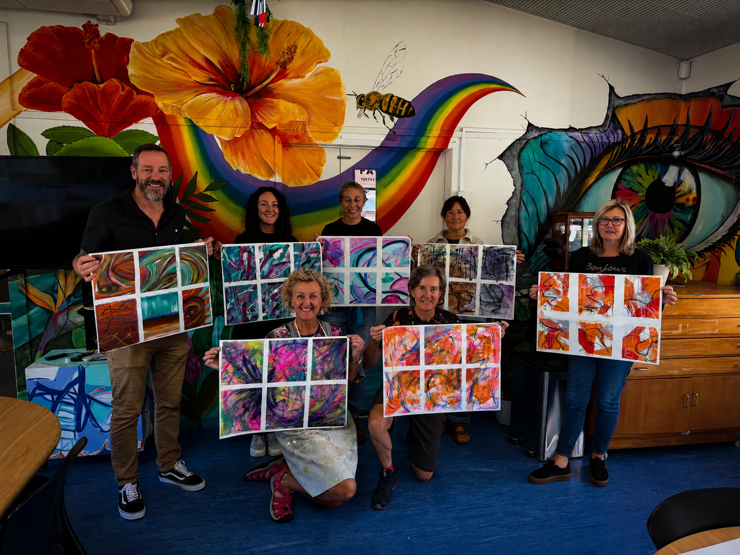Small group of retreat guests enjoying a creative moment together