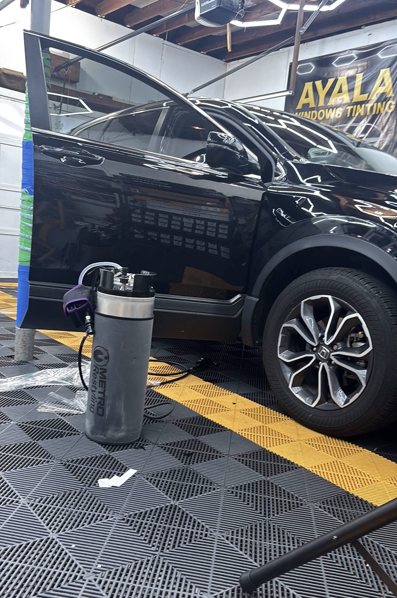 Black SUV with tinted windows at Ayala Windows Tinting