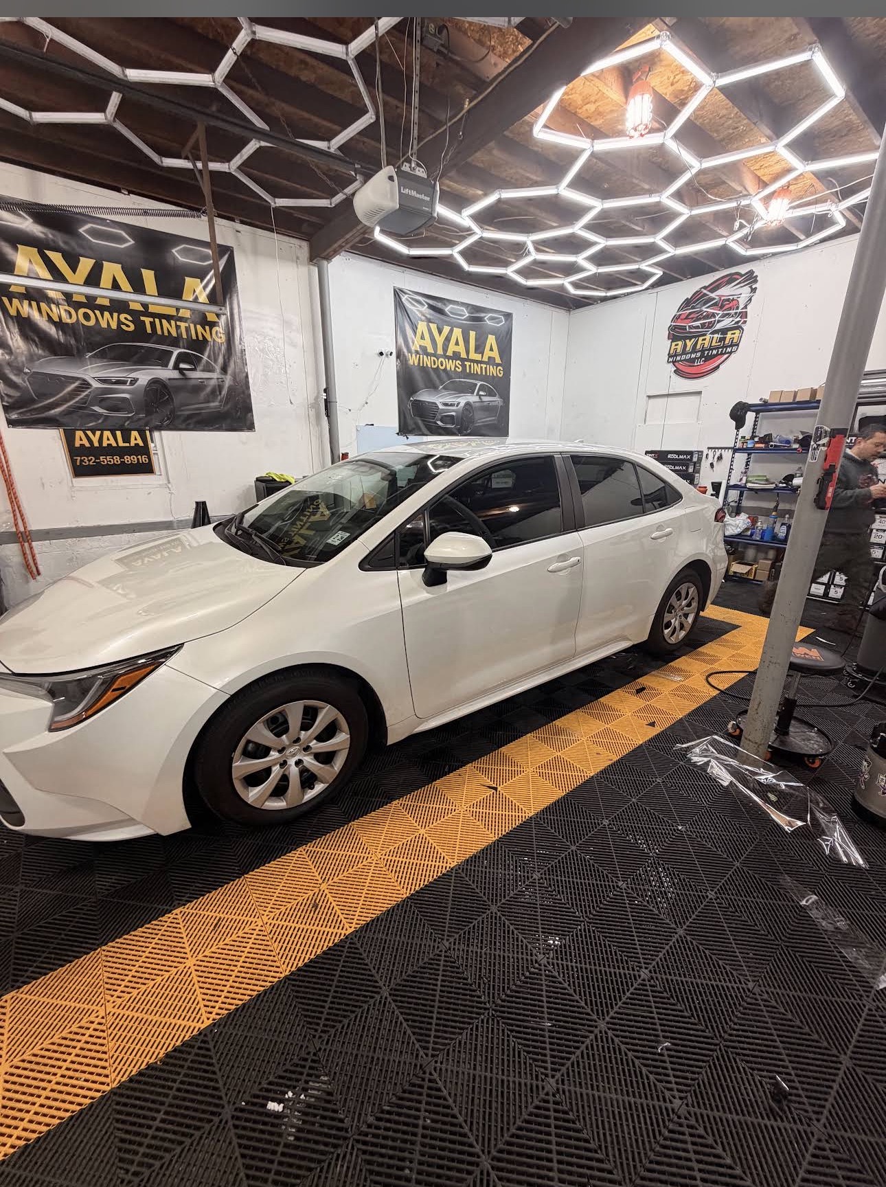 White sedan at Ayala Windows Tinting