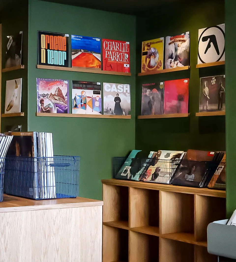Open cubby shelving and record browsing bins built by CTD Scotland at Lounge 33.