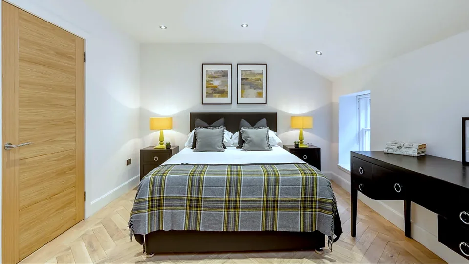 A completed bedroom in the two bedroom flat at Wemyss Mews, Edinburgh.