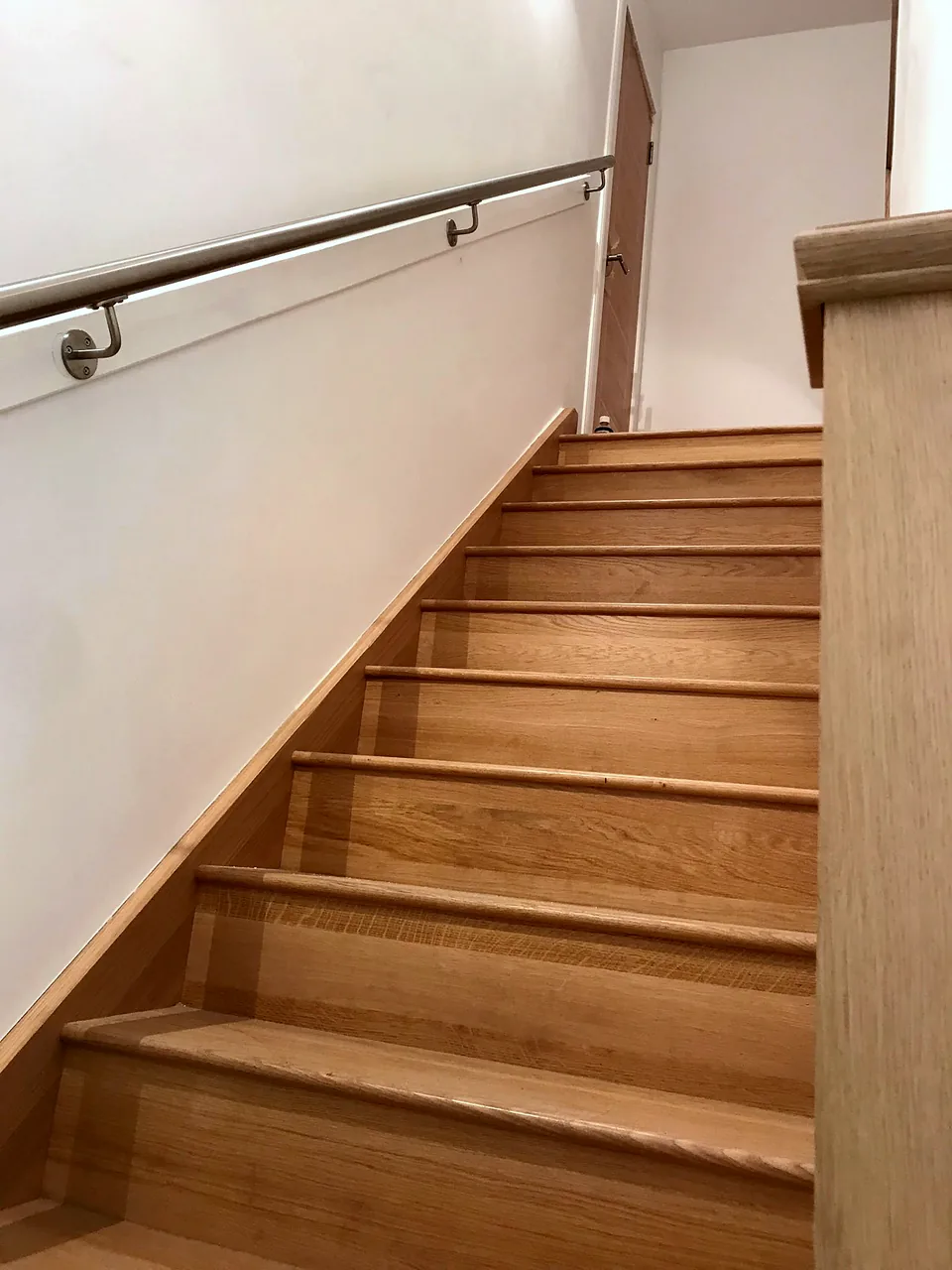 The new oak staircase linking both levels of the Wemyss Mews conversion.