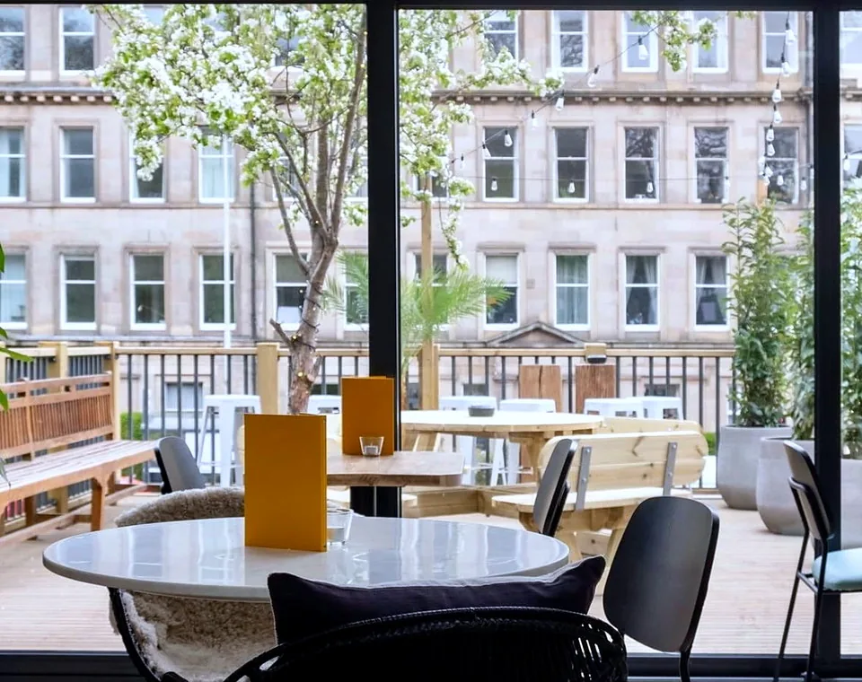 The dining room at Herringbone Abbeyhill, looking out to the terrace.