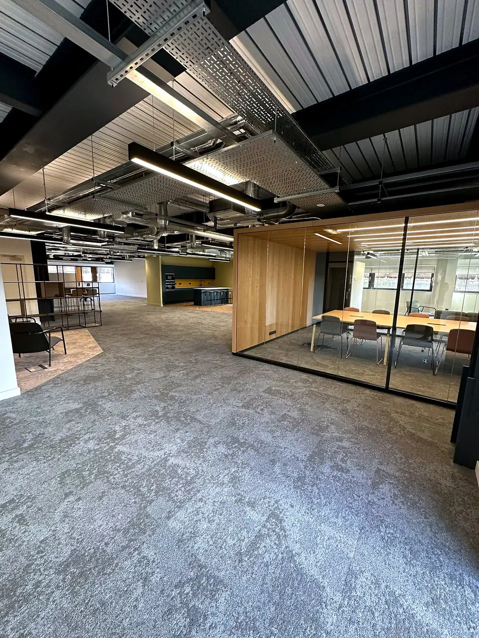 A glazed meeting room with timber detailing at 33 Castle Street, Edinburgh.