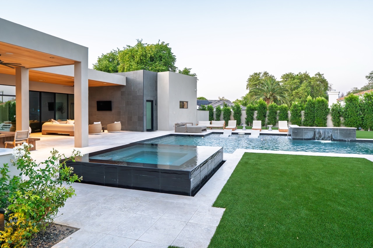 Backyard remodel with pool, raised spa and covered outdoor living