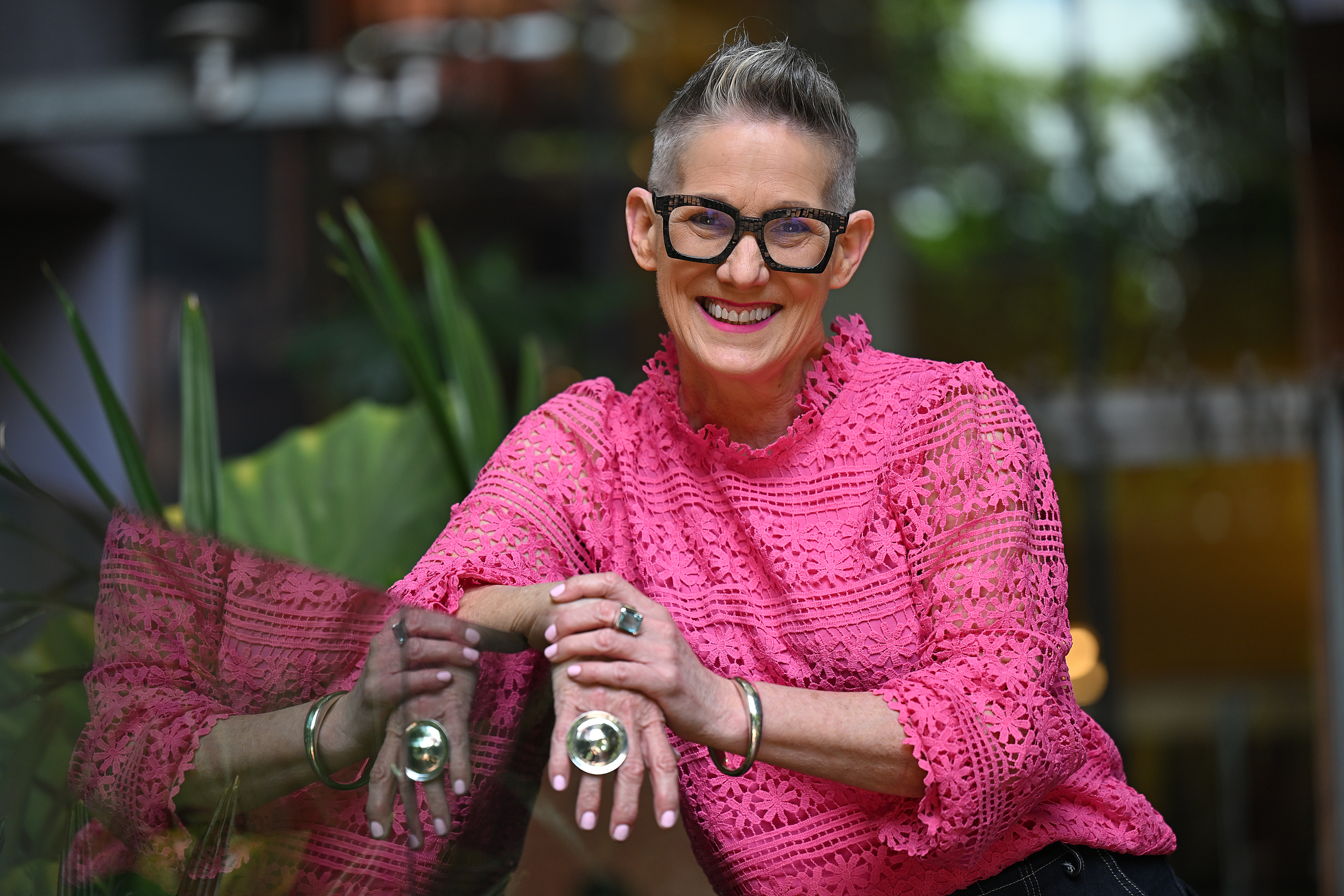 Vivian Crick smiling in a pink blouse