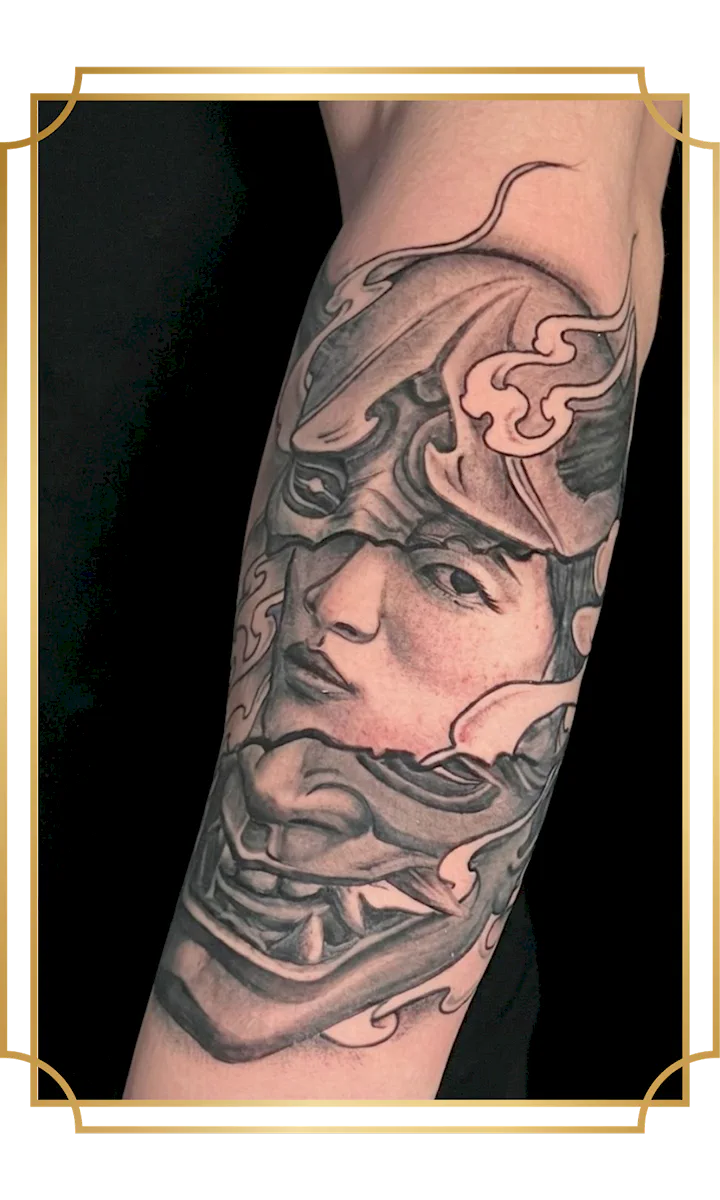 Black and gray illustrative female warrior tattoo with ornate helmet on the forearm