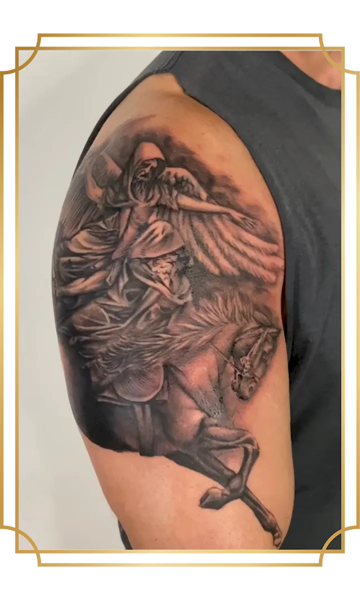 Black and gray grim reaper riding a horse tattoo on the upper arm