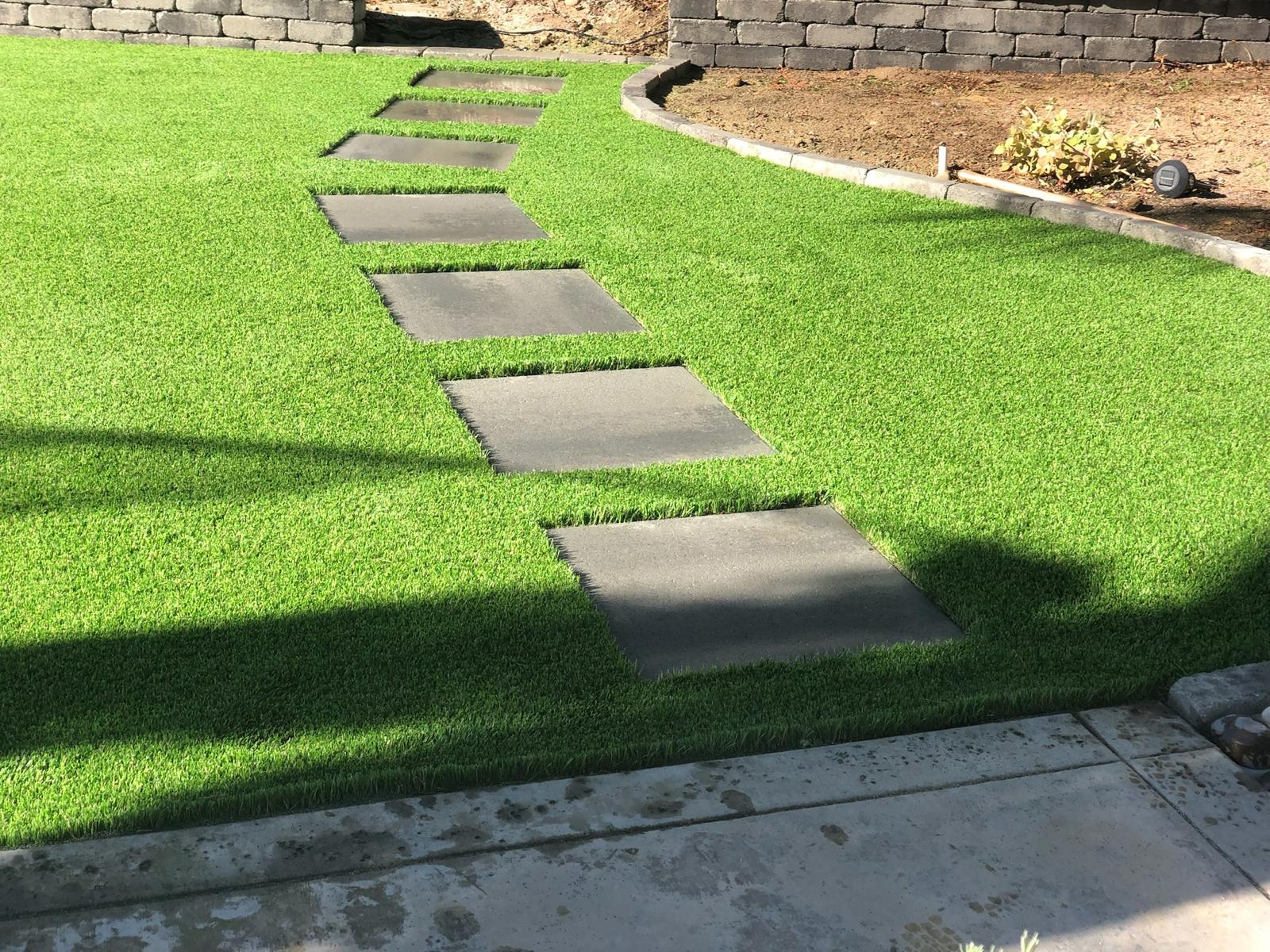 Artificial turf and stepping stones