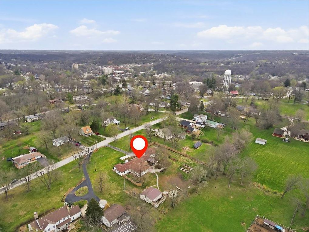 Homes for sale Excelsior Springs MO with acreage showing 1.43 acre lot with pond and mature trees near Kansas City