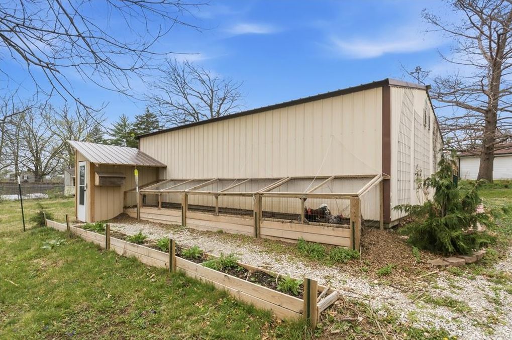 30x30 barn with chicken coop and raised garden beds at homes for sale Excelsior Springs MO with acreage near Kansas City