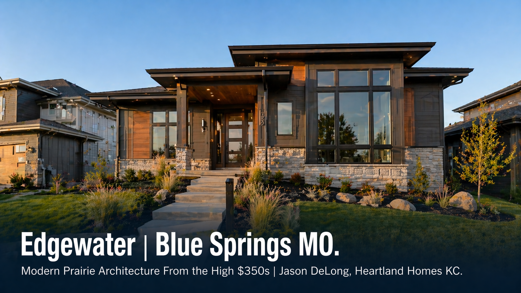Modern prairie-style new construction home in the Edgewater community in Blue Springs MO featuring dark fiber cement siding, oversized black-framed windows, and consistent neighborhood design standards starting in the high $350,000s by Jason DeLong Heartland Homes KC.