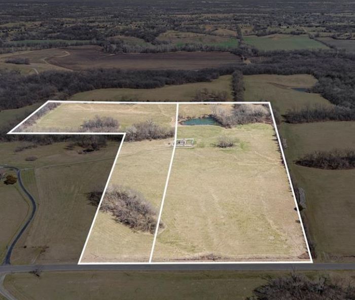 Aerial parcel map of 38.26-acre land for sale in Holt Missouri showing pond, rolling terrain, and property boundaries — Jason DeLong, Heartland Homes KC