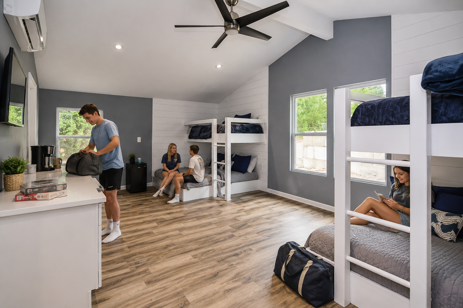 Lake Ozark vacation rental bunk room with white bunk beds, vaulted ceiling, private guest space, and flexible sleeping setup for families and groups. Lake Ozark vacation rental bunk room with white bunk beds, vaulted ceiling, private guest space, and flexible sleeping setup for families and groups.