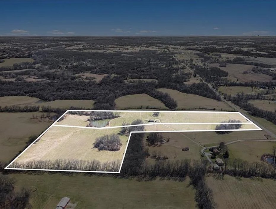 High-altitude aerial view of the full 38.26-acre parcel with boundary lines in Holt Missouri