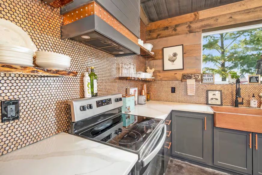 Fully equipped modern kitchen with stainless steel appliances